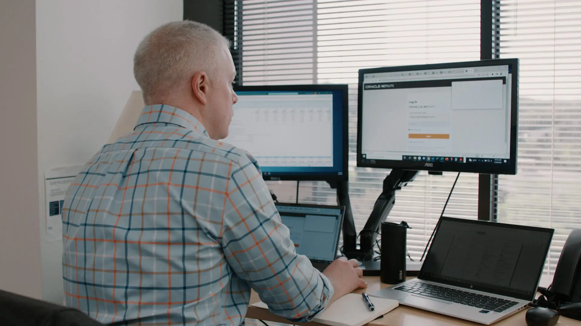 Businessman working at his computer in the Bridgepoint office